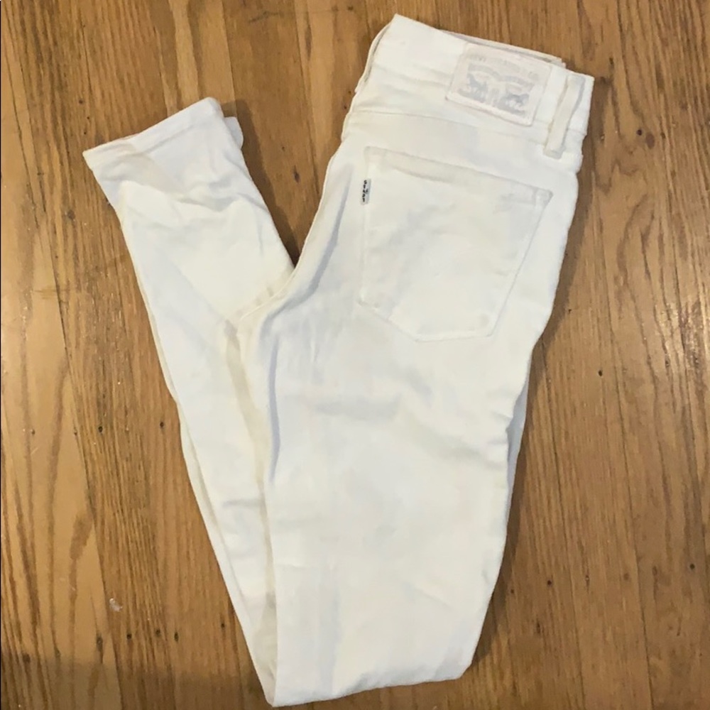 Levi’s 710 super skinny distressed white jeans